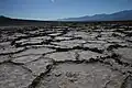 Repeated freeze-thaw cycle pushes salt crust into shapes that are like honeycombs and hexagons