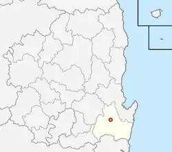 A region on an east coast is divided into 23 districts, with the southern coastal district highlighted.