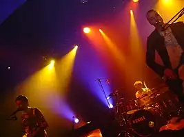 Muse, from left to right: Matthew Bellamy, Dominic Howard, and Christopher Wolstenholme