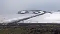 Robert Smithson's Spiral Jetty (1970) on the Great Salt Lake in Utah. With black basalt and earth from the site, he made a design 1,500 feet long and 15 feet wide.