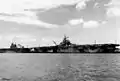 USS Enterprise and an Essex class aircraft carrier. Enterprise is on the left.