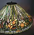 A Louis Comfort Tiffany & Co. Daffodil leaded glass table lamp (shade shown), designed by Tiffany's head designer, Clara Driscoll.
