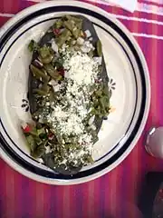 Tlacoyo, Mexican appetizer made of blue corn