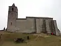 North facade of the church of St. Mary Magdalene without openings, typical of the alpine style