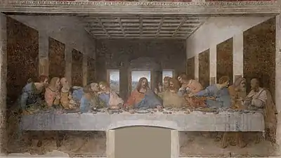  Rectangular fresco, in very damaged condition, of the Last Supper. The scene shows a table across a room which has three windows at the rear. At the centre, Jesus sits, stretching out his hands, the left palm up and the right down. Around the table, are the disciples, twelve men of different ages. They are all reacting in surprise or dismay at what Jesus has just said. The different emotional reactions and gestures are portrayed with great naturalism.