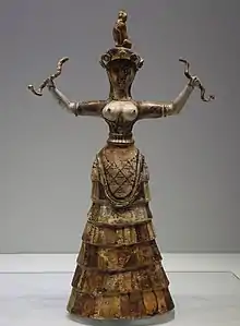 Snake goddess; 1460-1410 BC (from the Minoan Neo-palatial Period); faience; height: 29.5 cm; from the Temple Repository at Knossos; Heraklion Archaeological Museum