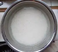 Soaking rice in a pot