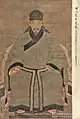 Ming dynasty man in full shenyi called daopao wearing a fujin.