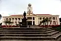 Another view of the Clock Tower, with a statue of Tan Kah Kee in front of it