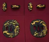 Fuchigashira (top) and tsuba (bottom) made by Ishiguro Masayoshi. Late Edo period. Designated as Special Important Fitting by NBTHK.