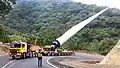 Mercedes-Benz SK Ballast Tractor pulling Goldhofer hydraulic modular trailer with FTV 300 blade lifter carrying a Windmill blade.