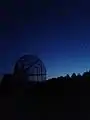 10-m radio telescope with Venus and Jupiter in the sky.