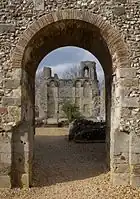 East Hall facade visible through an archway