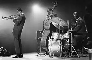 The Jazz Messengers in 1960. From left: Lee Morgan, Wayne Shorter (obscured), Jymie Merritt, and Art Blakey