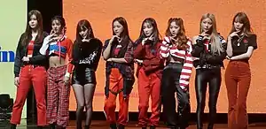 Gugudan at Act. 5 New Action showcaseFrom left to right: Soyee, Sally, Mimi, Sejeong, Hana, Mina, Nayoung, and Haebin.