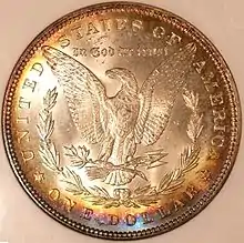 Iridescent toning on the reverse of a Morgan dollar