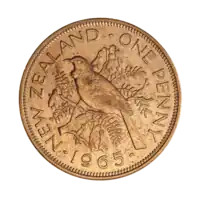 A penny featuring a tūī bird perched atop the branch of a kōwhai tree, surrounded by flowers and leaves, and encircled by the text "NEW ZEALAND - ONE PENNY - 1965"