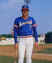 A baseball player in blue and white