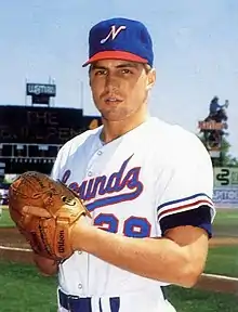 A baseball player in red, white, and blue