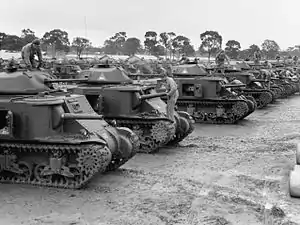 A line up of dozens, if not hundreds of tanks