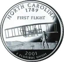 In 2001, the US Mint selected the first flight as the image North Carolina's issue in the state quarter series