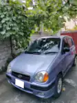 A blue Hyundai Santro 2004 version in Pakistan