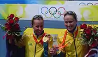 Snowsill (left) and Emma Moffatt (right) show off their medals.