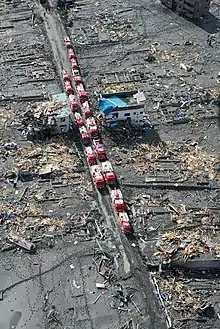 Emergency vehicles staging in the ruins of Otsuchi following the tsunami