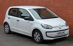 Small five-door car with steel wheels and door mirrors