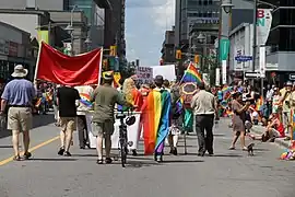 Participants marching down Bank Street in the parade, 2014