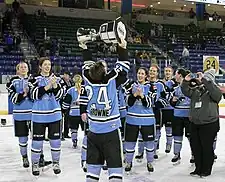 Harrison Browne of the Buffalo Beauts lifts the 2017 Isobel CupIsobel Cup.