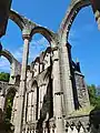 Ruins of the Arches at Fountains Abbey taken in the daytime.