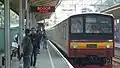 Ex-Nambu Line 205-0 series (NaHa 8) arriving Pondok Cina Station, May 18, 2016