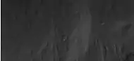 Close-up of part of previous image of wall of Valles Marineris, as seen by HiRISE under HiWish program