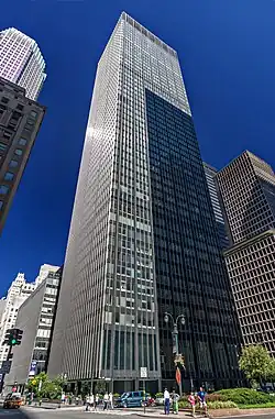 The facade of the Union Carbide Building at 270 Park Avenue, a glass-and-metal tower, as seen from Park Avenue and 48th Street