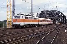 Deutsche Bundesbahn 111 158 with orange and white Rhine-Ruhr S-Bahn livery at Köln Hbf in 1985