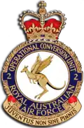 Crest of 2 Operational Conversion Unit, Royal Australian Air Force, featuring a winged kangaroo and the motto "Juventus Non Sine Pinnis"