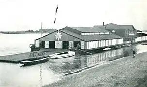 The floating boathouse of the Kölner Rudergesellschaft 1891 in Cologne, Germany