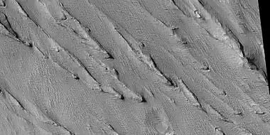 Yardangs, as seen by HiRISE under HiWish program. Location is near Gordii Dorsum in the Amazonis quadrangle. Note: this is an enlargement of previous image.