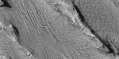 Yardangs, as seen by HiRISE under HiWish program. Location is near Gordii Dorsum in the Amazonis quadrangle. Note: this is an enlargement of previous image.