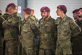 German soldiers wearing Flecktarn shirts and trousers.