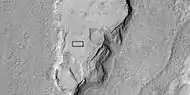 Enlarged view of a part of previous image,  as seen by HiRISE under HiWish program.  The rectangle represents the size of a football field.