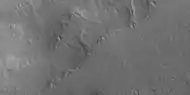 Close view of slopes that contain tilted layered features, as seen by HiRISE under HiWish program.  Note: this is an enlargement from the previous image.