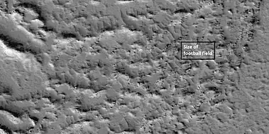 Close view of a lava lobe, as seen by HiRISE under HiWish program. The box shows the size of a football field.