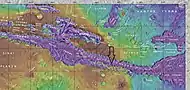 Labeled map of features near to Coprates Chasma.  Arrow shows location of recurrent slope lineae in following HiRISE images.