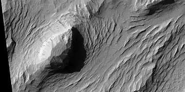 Layers and dark slope streaks, as seen by HiRISE under HiWish program