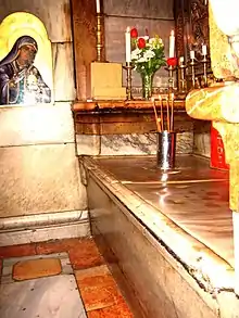 The Tomb of Jesus (raised platform to the right, interior the second chamber inside the aedicula)