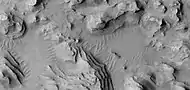 Close view of layers, as seen by HiRISE under HiWish program.  A fault is visible.