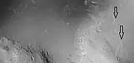 Close view of craters that just have ejecta on one side.  Image acquired  by HiRISE under HiWish program.