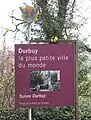 City limit sign representing Durbuy as the smallest city in the world